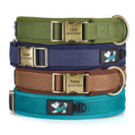 Load image into Gallery viewer, Stack of four personalised dog collars in green, blue, brown, and teal with engraved names and phone numbers.
